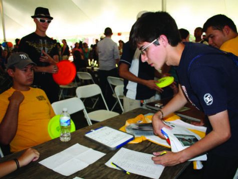 A student signs up for a club at the annual Clubs and Organizations Fair on Tuesdays, August 25, 2009. 80 clubs and organizations were present (over 55% were USGA-recognized clubs), as were a half dozen vendors.