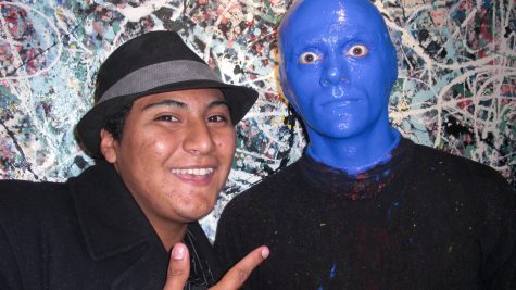 Charger Bulletin staff writer Stephen Acevedo with a member of The Blue Man Group after their show, sponsored by SCOPE, on Saturday, Oct. 17.  (A Maideline Sanchez/Charger Bulletin Photo)