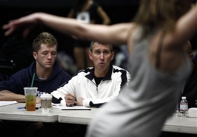 Producer and choreographer Adam Shankman, center, watches a dancer perform during open dance auditions for the 82nd Academy Awards Telecast in Burbank, Calif. on Friday, Jan. 22, 2010.  (AP Photo/Matt Sayles)