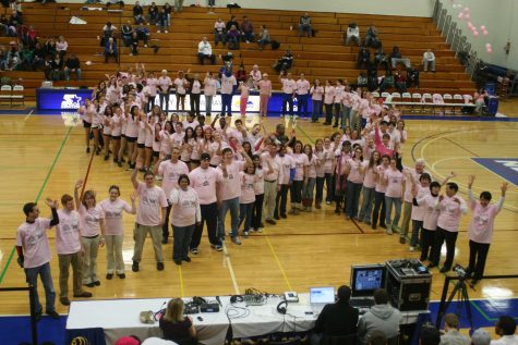 During the time between the games, all the faculty, staff, and students wearing pink gathered outside to create a gigantic pink breast cancer ribbon.