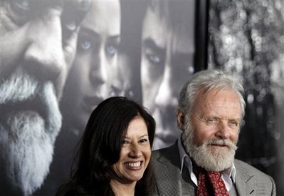 Cast member Anthony Hopkins, right, and Stella Arroyave arrive at the premiere of The Wolfman in Los Angeles on Feb. 9, 2010.  (AP Photo/Matt Sayles)