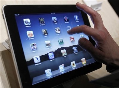 FILE - In this Jan. 27, 2010 file photo, the iPad is shown after it was unveiled at the Moscone Center in San Francisco. (AP Photo/Marcio Jose Sanchez)