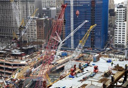 In this photo taken March 5, 2010, the World Center Hotel, far right, overlooks the World Trade Center construction site in New York. With rooms boasting views directly out on the construction, the hotels proximity to the site of the Sept. 11 attacks is being used as a marketing tool. (AP Photo/Mark Lennihan)