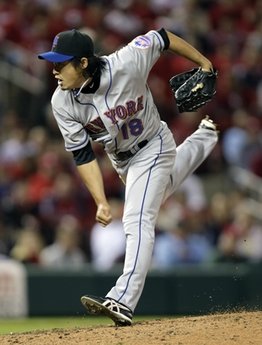 New York Mets reliever Ryota Igarashi (18) follows through on a pitch in the eighth inning of a baseball game against the St. Louis Cardinals, Sunday, April 18, 2010 in St. Louis. Igarashi surrendered the go-ahead home run as the Cardinals beat the Mets 5-3. (AP Photo/Tom Gannam)