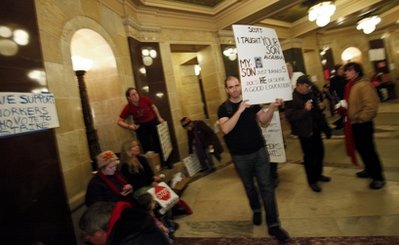 3 GOP Senators are Needed at the State Capitol in Madison, Wis., Sunday, Feb. 20, 2011. (AP Photo/Andy Manis)