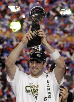 Green Bay Packers Aaron Rodgers poses with the Vince Lombardi Trophy after the NFL Super Bowl XLV football game against the Pittsburgh Steelers Sunday, Feb. 6, 2011, in Arlington, Texas. The Packers won the game 31-25. (AP Photo/Mark Humphrey)