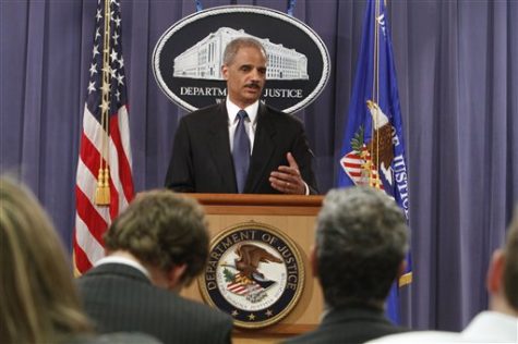 Attorney General Eric Holder gestures during a news conference at the Justice Department in Washington, Monday, April 4, 2011, where he announced plans to try avowed 9/11 mastermind Khalid Sheikh Mohammed and four alleged henchmen before a military commission.  (AP Photo/Jacquelyn Martin)