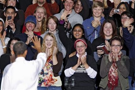 President Barack Obama is applauded by students and faculty after his speech at Auraria Events Center in Denver, Wednesday, Oct. 26, 2011. Obama outlined a plan to allow millions of student loan recepipients to lower their payments and consolidate their loans. (AP Photo/Ed Andrieski)