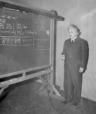 In this Dec. 28, 1934 file photo, Albert Einstein delivers a lecture at the meeting of the American Association for the Advancement of Science in the auditorium of the Carnegie Institue of 