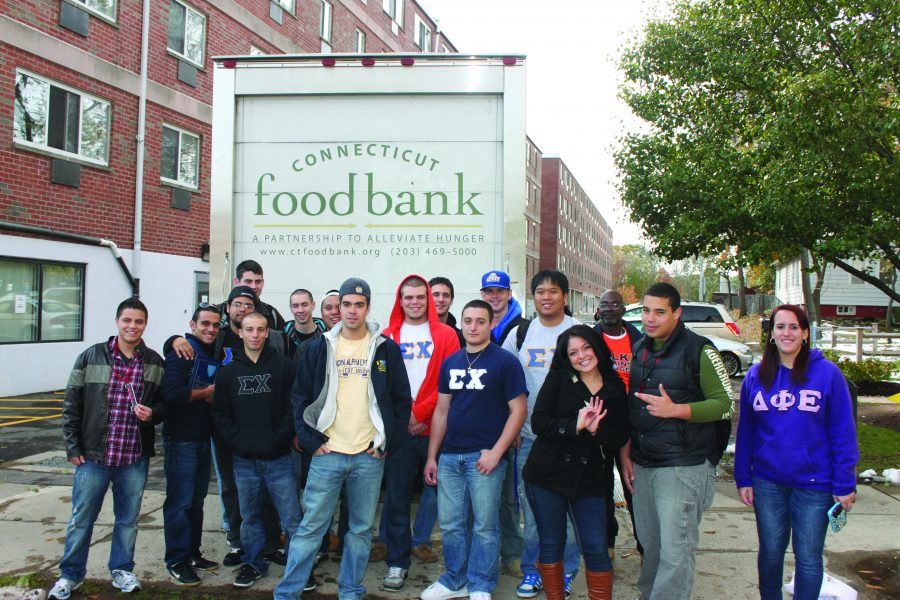 A group of students, members of various Greek organization at the University of New Haven, participating in Halloween for Hunger.