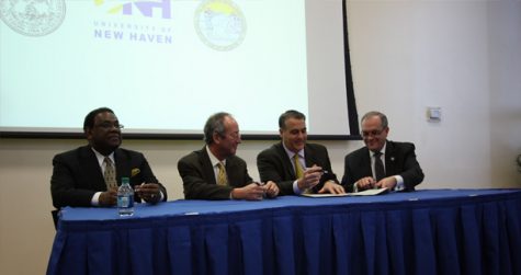 The agreement was signed by New Haven Mayor John DeStefano, West Haven Mayor John Picard, UNH President Steven Kaplan and New Haven School Superintendent Reginald Mayo.