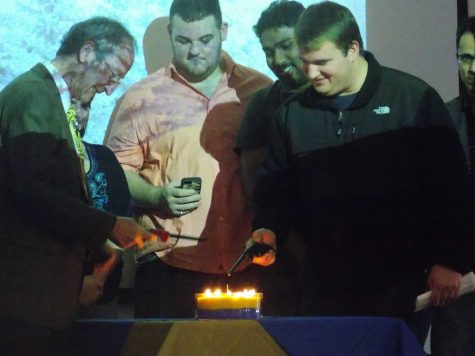 President Kaplan, along with USGA president Patrick Kelland, lit the final wick located at the center of the candle. This act symbolized unity at UNH.