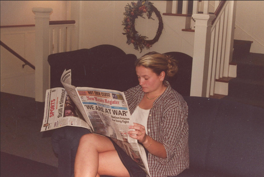 Woman reads the New Haven Independent two days after the 9/11 terrorist attacks. 

(UNH Archives)