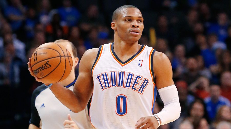 Oklahoma City Thunder guard Russell Westbrook (0) brings the ball up the court in the fourth quarter of an NBA basketball game against the Orlando Magic in Oklahoma City, Sunday, Dec. 15, 2013. Oklahoma City won 101-98. (AP Photo/Sue Ogrocki)