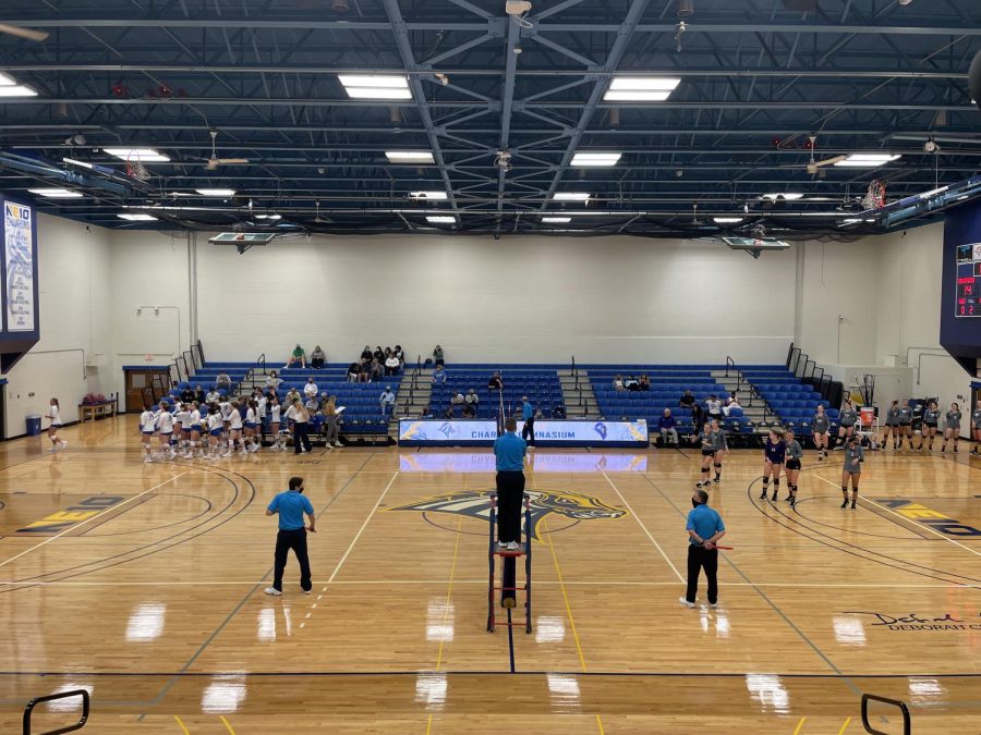 Womens volleyball in a timeout against Bridgeport, West Haven, CT. 2021.