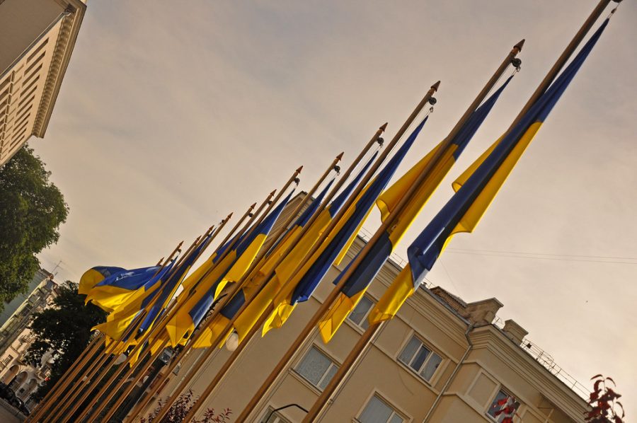 A row of Ukrainian flags outside the House with Chimaeras, Kyiv, Ukraine.