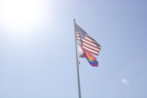 American Flag and Pride Flag flying over Kayo Field, West Haven