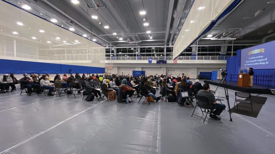 University community members sit inside of the Beckerman Recreation Center for the event, West Haven, Jan. 26, 2022.