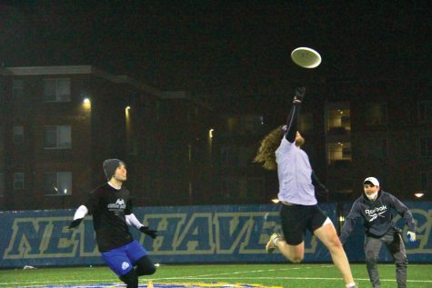 Members of the Ultimate team scrimmage during practice at Kayo Field, West Haven, Feb. 7, 2022
