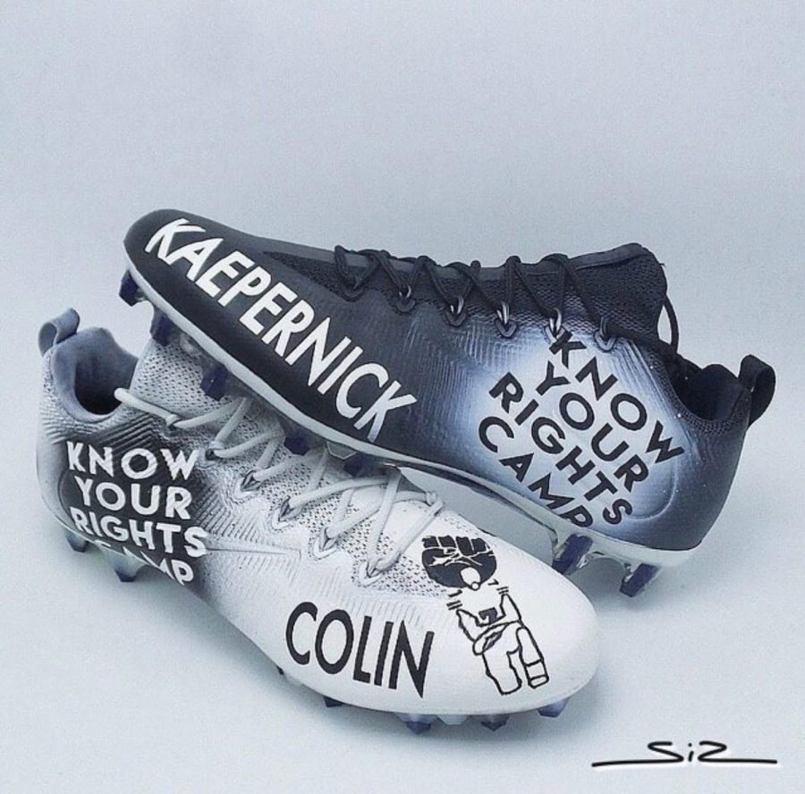 A pair of cleats sponsored by Know Your Rights Campaign.
