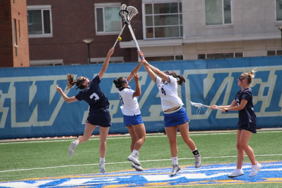 Giana+Caprioli+%28right%29%2C+NE10+Defensive+Player+of+the+Week%2C+after+the+draw+in+the+game+against+Saint+Anselm.+West+Haven%2C+April+24%2C+2022.