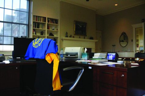 University of New Haven t-shirts lie on top of a chair in Chancellor Kaplan’s empty office, West Haven, Aug. 31, 2022.