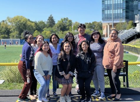 Students from a variety of university organizations stand in united support and recognition of Hispanic Heritage Month, West Haven, Sept. 21, 2022.