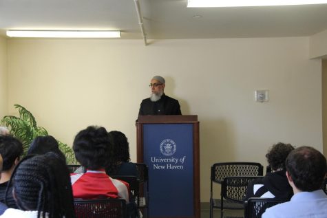 Imam Omer speaks to students at the reopening, West Haven, Sept. 29, 2022.