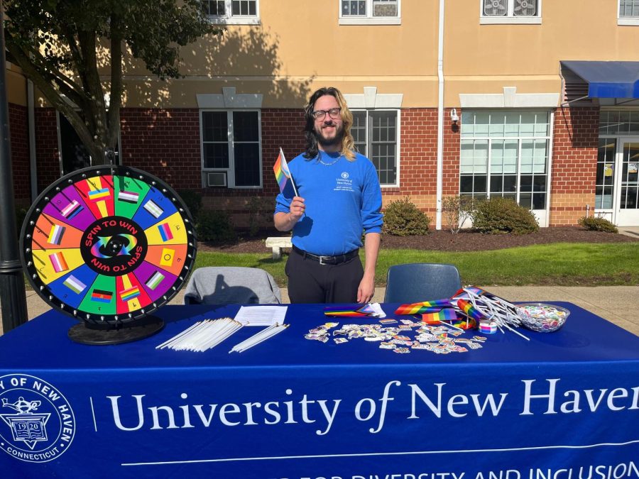 Assistant Director of LGBTQ+ Resources at the Myatt Center Ian Shick at their table during the fair, West Haven, Oct. 12, 2022. 
