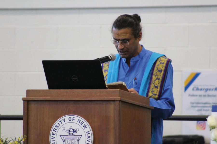Pujari Jagadheesh Sharma reads a mantra at the Celebration of Life ceremony, West Haven, Nov. 9, 2022. 