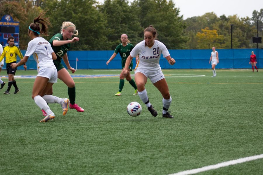Madison Blonde dribbles against Le Moyne College, West Haven, Oct. 1, 2022.