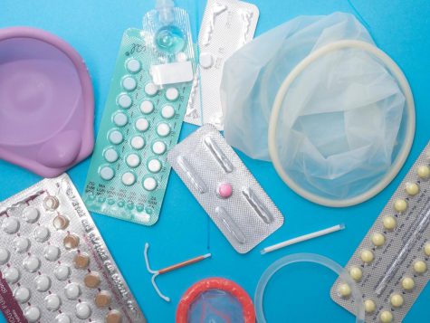 A table of various contraceptives.