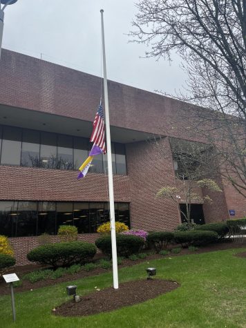 The flag outside of the library remains at half-mast, West Haven, April 16, 2023.