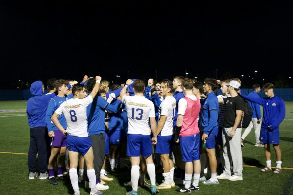 New Haven mens soccer celebrates a 1-0 win over the College of Staten Island, West Haven, Oct. 11, 2023.