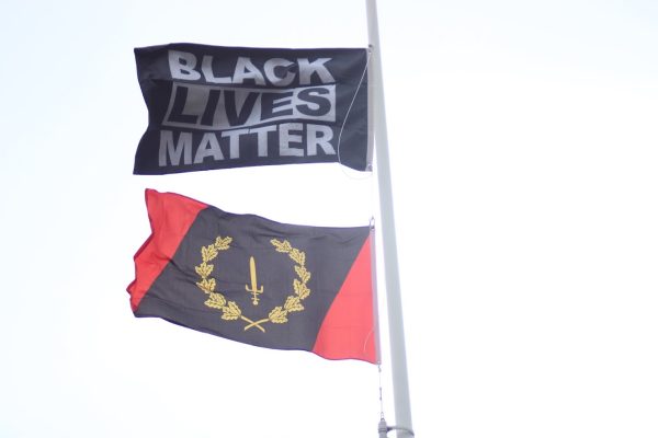 Black Lives Matter and Black American heritage flags above Kathy Zolad Stadium, West Haven, Feb. 1, 2024.