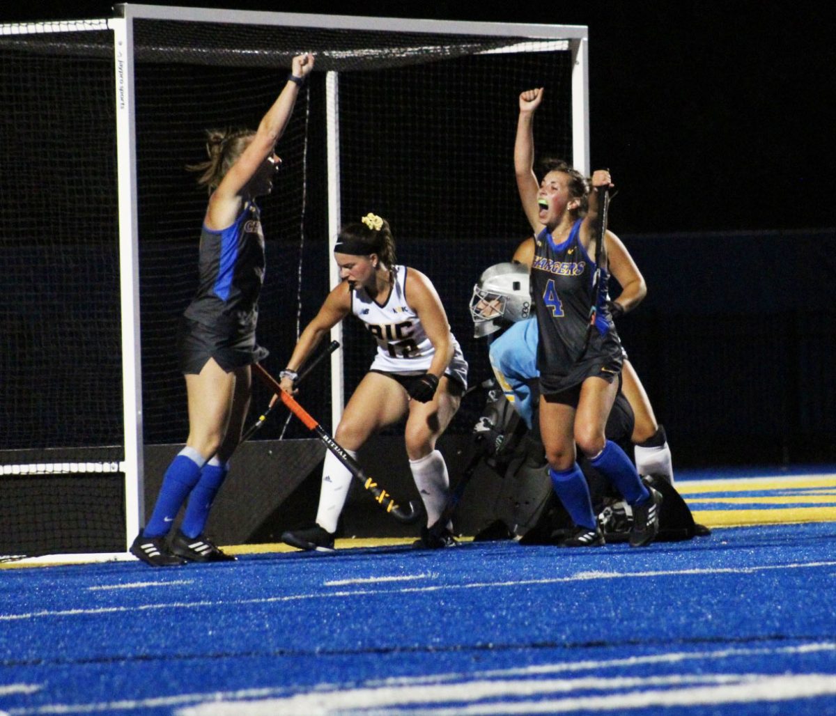 #7 Kat Trammel amd #4 Abby Nixon celebrating win against AIC, West Haven, Sept. 5, 2024.