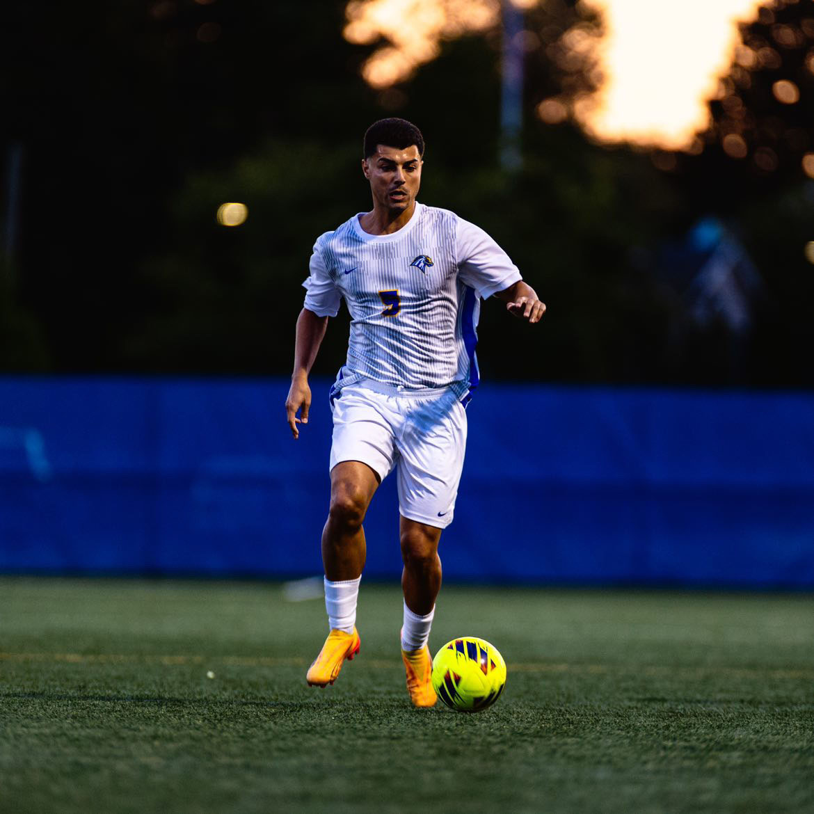 Albert Porqueras pushes the ball against Holy Family, West Haven, Sept. 5, 2024.