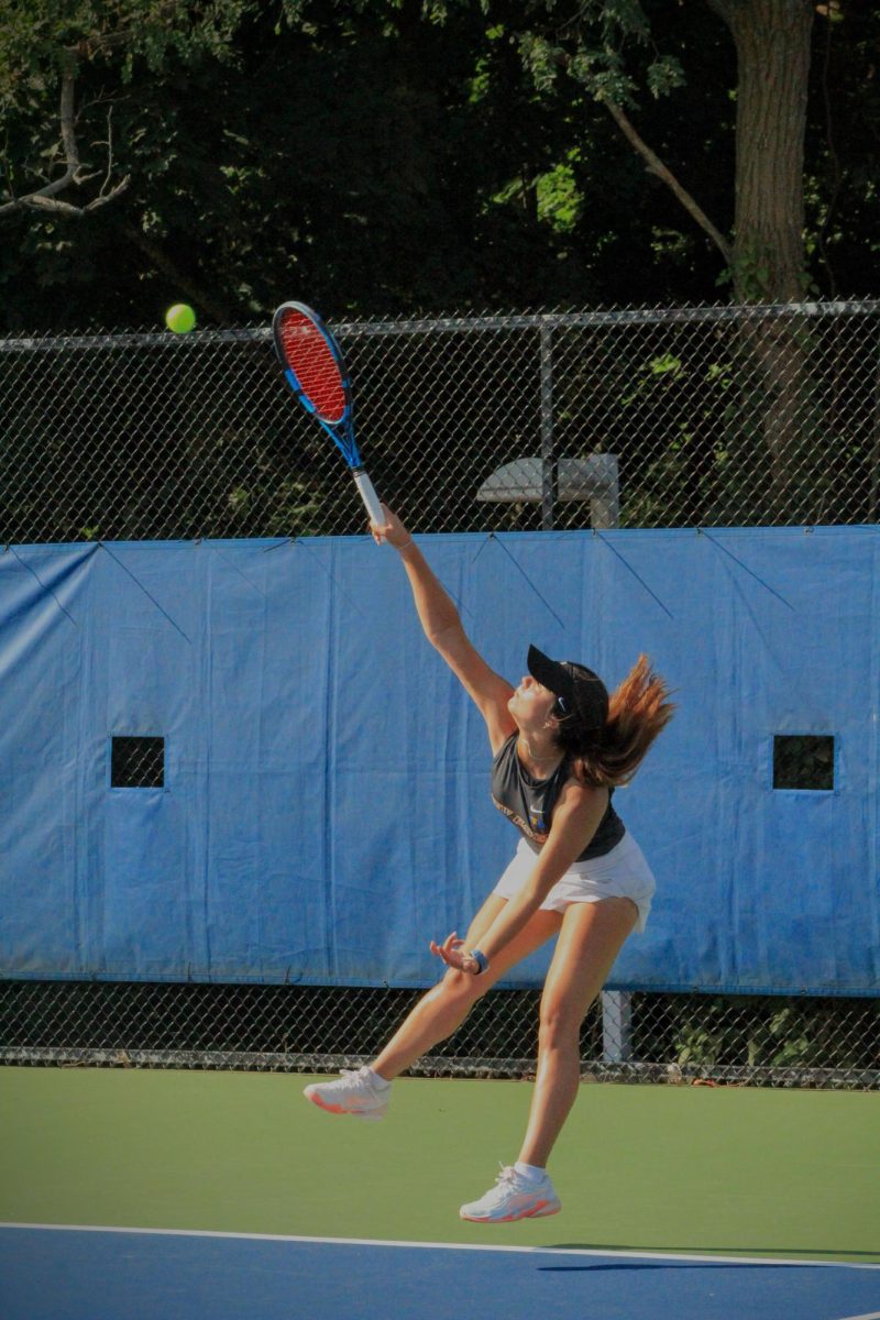 Karim Carreras on a serve against Franklin Pierce