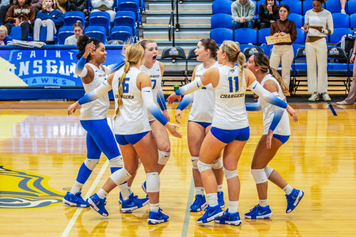 The Charger celebrating win against Saint Anselm University