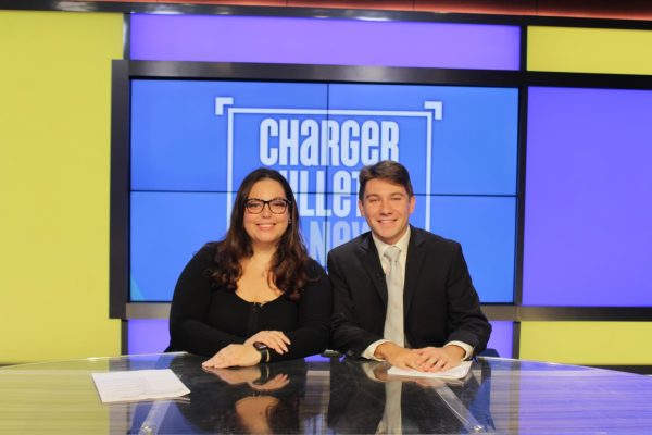 Haiden Leach (left) and Joe Markowski (right) at the Charger Bulletin news desk