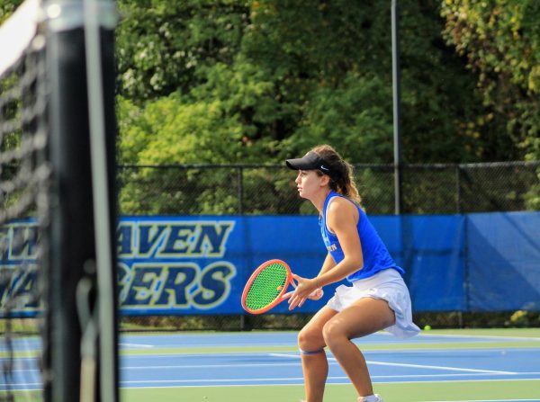 Valentinna Ferrarini playing in a match against Bentley University