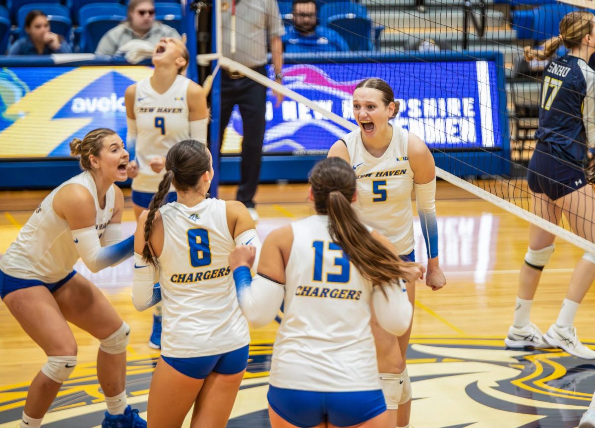 Women's volleyball celebrates win