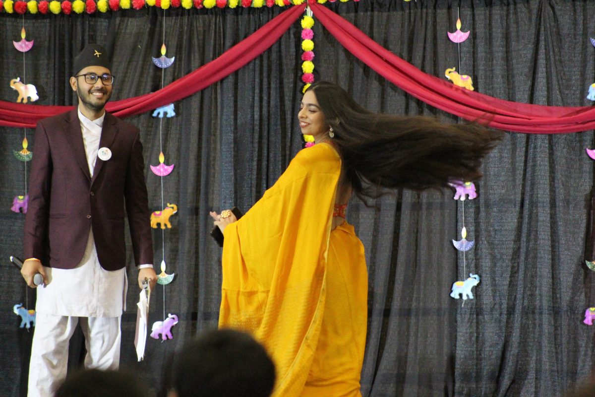 Student dancing at the Diwali event