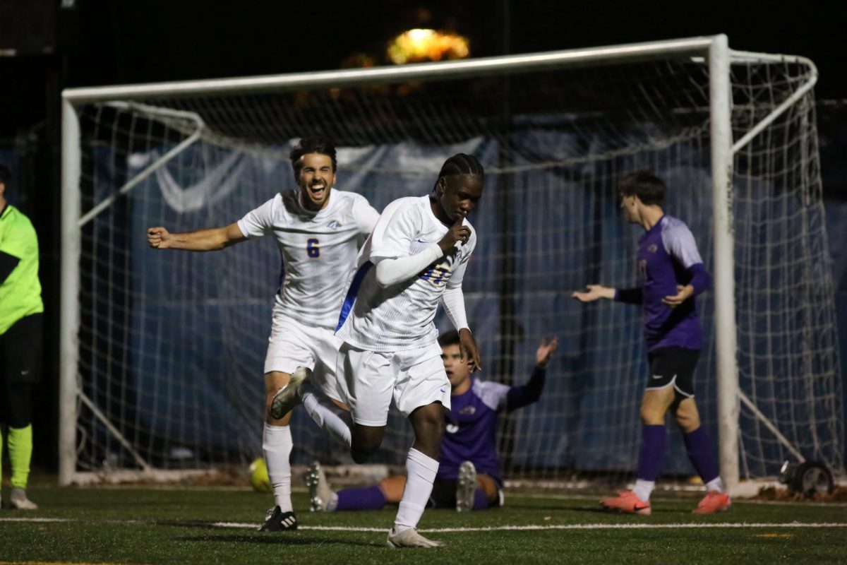 #6 Anthony Denis celebrates a goal with #37 Darsein Gabriel