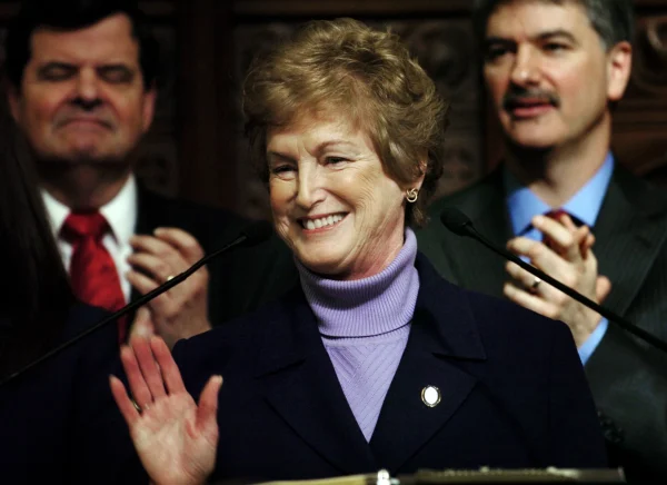 Governor M. Jodi Rell acknowledges a standing ovation as she begins her State of the State address in front of the Connecticut legislature