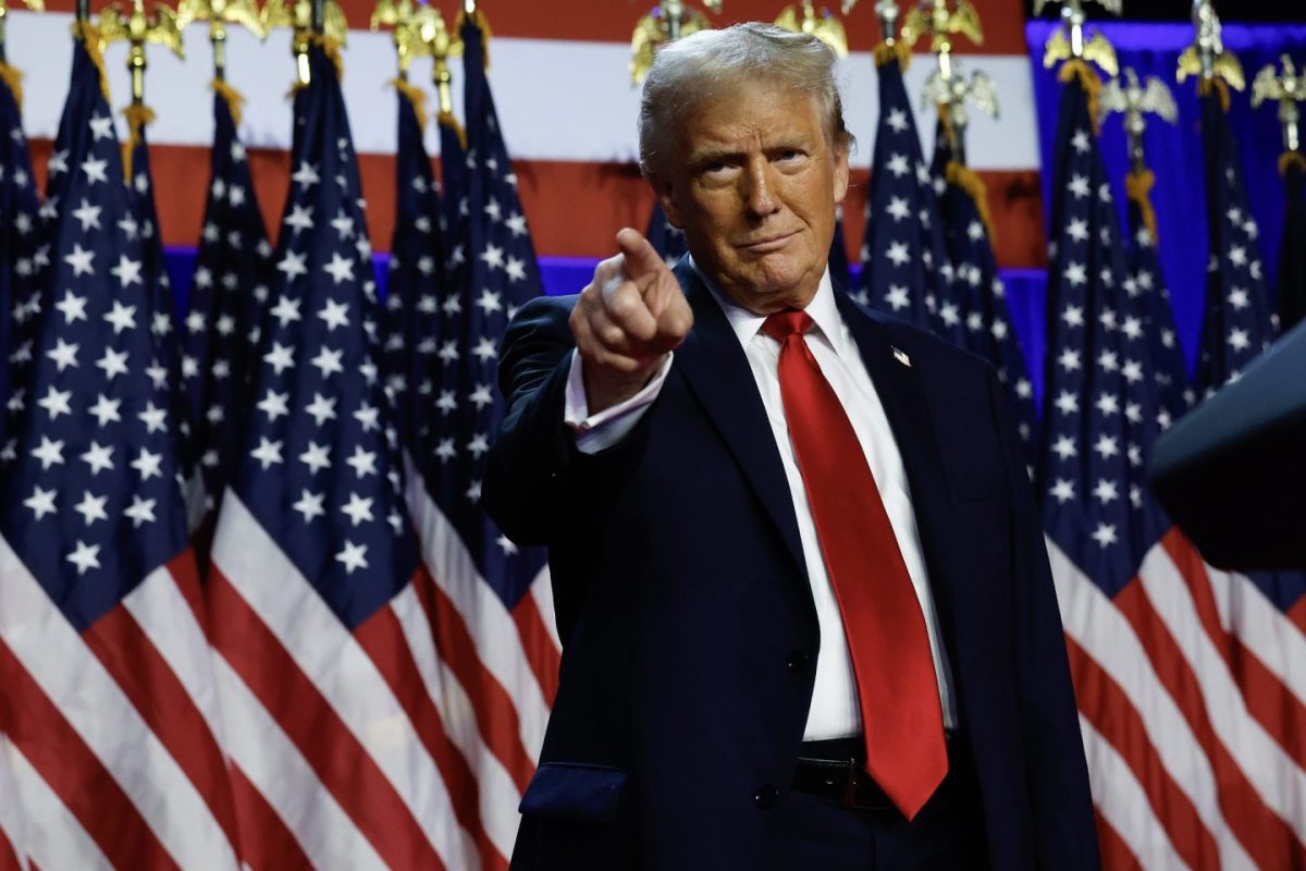 Donald Trump point out to crowd at Palm Beach Convention Center on election night