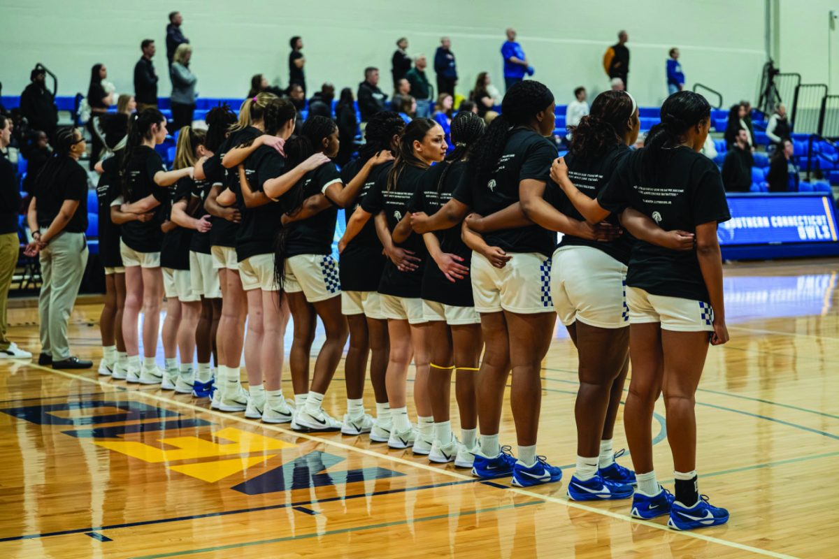 Women's basketball team before tip-off. 