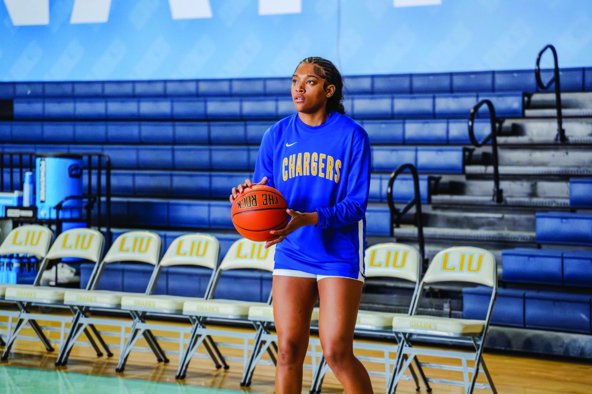 Aniya McDonald-Perry practicing before the game. 

