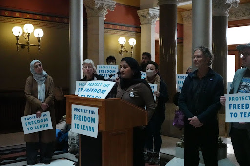 Rep. Maryam Khan speaking in Hartford Capital beside Chairperson Shelly Altman.
